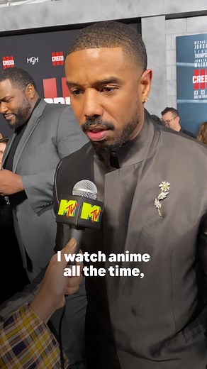 Me 🤝 #MichaelBJordan fanning out over his anime faves on the #Creed3 premiere carpet