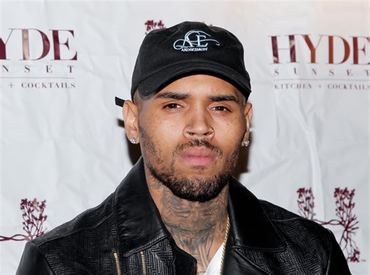 Chris Brown’s 2009 Rihanna Assault Cited by Warner Bros in Defamation Suit