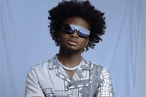 Watch as Kuami Eugene sets car, VGMA outfit, and Bandana on fire to announce new album