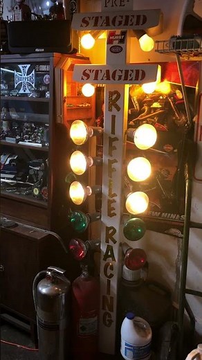Drag racing Christmas tree made from a plastic fence post and traffic lights controller.
