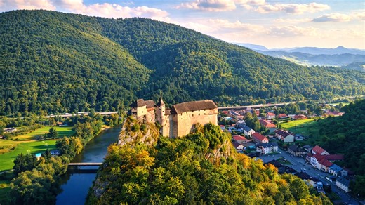 The castle built on a rock above the river in Slovakia