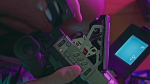 Retro VHS Camcorder in Neon Light in 90s Ambience