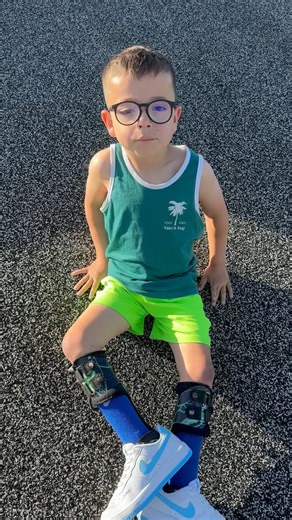 8.7K views · 4.2K reactions | OOTD! I had to document Roman’s outfit choice today  the kid loves him a tank top! Of course Gracie had to get in on the action too. | Defying Odds: Roman's Journey | Facebook