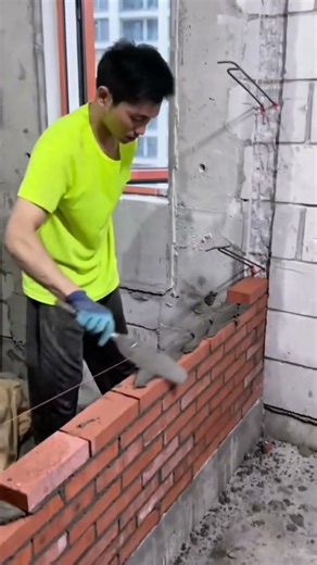 Example of building interior walls in a house with brick installation