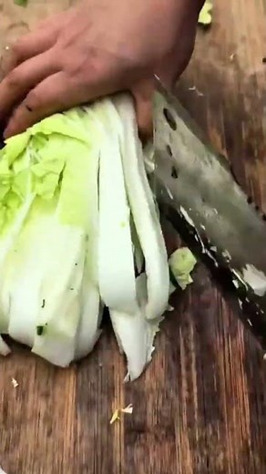 The process of cutting cabbage using a sharp knife is simple, easy and fast.