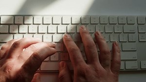 Working typing on pc, Old vintage keyboard retro pc close-up , Old computer studio close-up, Desktop vintage retro wave display, late 90s PC.
