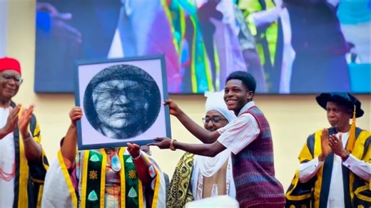A 400-level Computer Science student presented a gift on behalf of Ahmadu Bello University students to WTO Director-General Dr. Ngozi Okonjo-Iweala at the 45th Pre-Convocation Lecture, leaving her impressed despite her remark that she usually dislikes portraits of herself. | Bulo Visuals