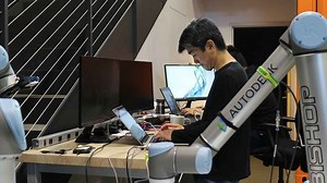 Experimental Brickbot stacks Legos just like a kid