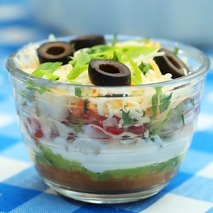 7-Layer Dip To Go In 15 Minutes Or Less Layer up a loaded dip for each of your loved ones, and enjoy on the go. And with GEICO, you could save 15% or more on car insurance. https://on.gei.co/2LR50nB | Tasty
