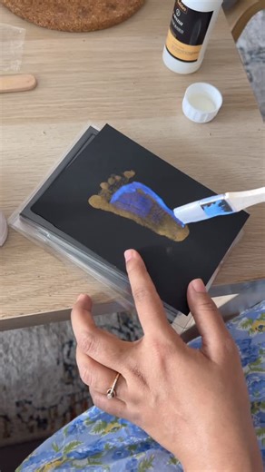 Janu Jahnavi | 📍Dallas, TX on Instagram: "Comment ‘frame’ below to get the frame link. I found a baby hand and footprint kit where there’s no paint or mess. Ink is sealed inside the pad, so it never touches the baby. The surface they press is safe and non-toxic. Though it may look like carbon paper, it isn’t — it’s a special inkless pad that transfers the print onto paper without any mess. Note : Press the baby’s hand or foot only once — don’t rub, or the print may turn messy. Each pad can be u
