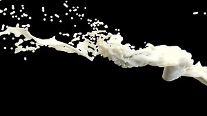 Milk splash on black background 4k | Premium Stock Video Footage