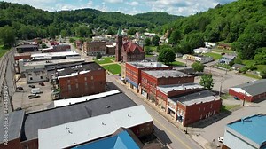 WEST VIRGINIA - 7.5.2024 - Fantastic aerial footage approaching the Barbour County Courthouse of Philippi, West Virginia.