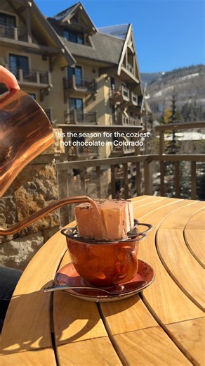 Steph & Kenny | Travel Couple on Instagram: "Would you spend $25 on a cup of hot chocolate? 🫢 This is “The Remedy Bar” at the Four Seasons Hotel in Vail, Colorado📍 TIP: Go as soon as they open and get your name on the outdoor seating list 😍 it’s stunning and so worth it! Plus, it’s perfect for lunch (I literally crave their ramen dish) Comment “Winter” for our free 7-day Vail itinerary ❄️ And follow @sktravelbloggers for more travel inspo 🥰 . . #vail #colorado #wintervibes #asmr #travel #vis