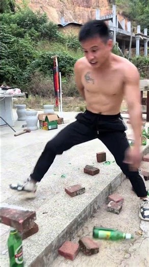 Invincible Iron Palm, smashes 20 beer bottles in one go. #kungfu #challenge #boxing