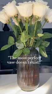 White roses in a green vase perfect for fall home decor