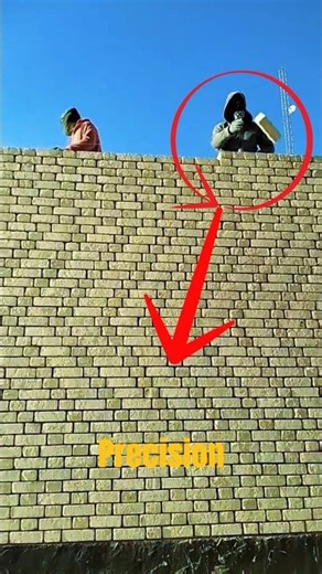 Bricklayer Using Mortar Finishing Trowel on Top Wall – High Speed Masonry Work.