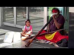 Aboriginal Guy Playing Didgeridoo