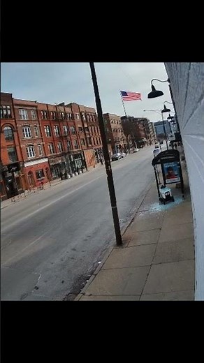 Food delivery robot crashes through a CTA bus stop