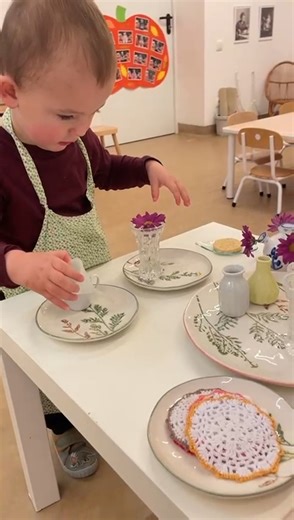 Flower arranging is an excellent skill for the children to learn. When practiced regularly over time, practical life activities like arranging flowers can help create positive lifelong habits. Maria Montessori made an interesting statement: "𝙒𝙝𝙚𝙣 𝙮𝙤𝙪 𝙝𝙚𝙡𝙥 𝙖 𝙘𝙝𝙞𝙡𝙙 𝙪𝙣𝙙𝙚𝙧𝙨𝙩𝙖𝙣𝙙 𝙞𝙩𝙨 𝙨𝙚𝙣𝙨𝙤𝙧𝙮 𝙖𝙣𝙙 𝙖𝙚𝙨𝙩𝙝𝙚𝙩𝙞𝙘 𝙨𝙚𝙣𝙨𝙞𝙗𝙞𝙡𝙞𝙩𝙞𝙚𝙨, 𝙮𝙤𝙪 𝙥𝙧𝙚𝙥𝙖𝙧𝙚 𝙩𝙝𝙚𝙞𝙧 𝙢𝙤𝙧𝙖𝙡 𝙖𝙬𝙖𝙧𝙚𝙣𝙚𝙨𝙨!" #toddlerschool | Warsaw Montessori Family