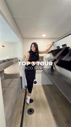 Rear Living Bunkhouse?! This Fifth Wheel Does Both 😱🔥 The Jayco Eagle 377RLBH is a luxury bunkhouse fifth wheel built for families who want space, privacy, and residential comfort. With a rear living layout and a dedicated mid-bunk room, this coach balances entertaining, sleeping flexibility, and long-stay livability. – Rear living room with theater seating tri-fold sofa – Mid-bunk room with sofa, storage & overhead bunk – Large kitchen island with solid-surface countertops – Residential-size 