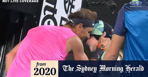 Nadal comforts ball girl after being hit in the face