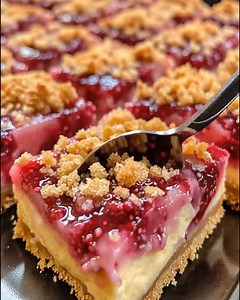 25K views · 188 reactions | Lemon Raspberry Cheesecake Crunch Bars Recipe Ingredients For the Crust: 1 1/2 cups graham cracker crumbs 1/3 cup melted butter 1 1/2 cups cream cheese (softened) enjoy❤ | Optimal Recipes | Facebook