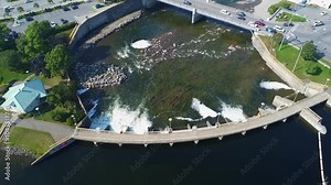 Aerial view of the picturesque town of Matane in Quebec, its dam and salmon pass at the mouth of the Matane River. A town in harmony with nature.
