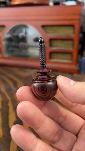 Spinning Top Tom | Premium Fidget Toys on Instagram: "A great top made by a top maker! - @spintopjon  Featuring a wooden spin station made by Spin in Style. #SpinningTopTom #woodturning"