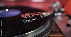 80s turntable, a vinyl rotates on the platter, vintage hi fi components