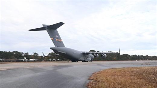 Loadmaster prepares C-17 for next mission