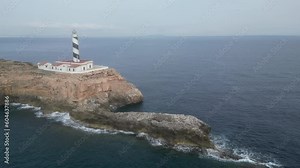 Lighthouse on the steep shore of the rocky sea. Palma, Spain. Drone view.