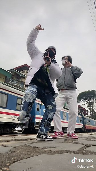 Dance Moves on Train Platform: Creative Duet Performance