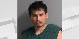 Man arrested after charging at deputies with machete