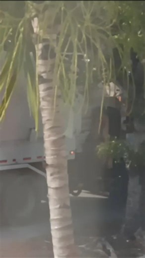 Labrie Automizer Autocar with a supervisor pickup trailing it
