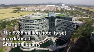 A 336-room hotel sunk into a disused quarry in China has overcome tough engineering challenges to open its doors and welcome its well-heeled clientele. Preventing the 88-metre-deep pit from flooding was among the main challenges to building the InterContinental Shanghai Wonderland, part of a development that also includes a theme park. | AFP News Agency