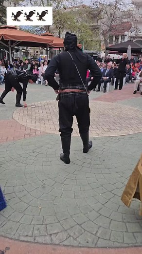 Choreographed Sword Fight Performance in Public Square