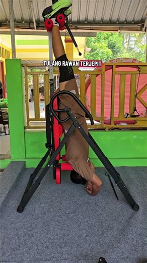 Daily therapy for pinched nerve pain using Velomax inversion table and spinal stretching