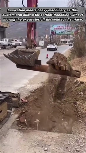 Ingenious Excavator Attachment Makes Roadside Trenching Look Very Easy
