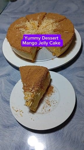 💕😋 Yummy Dessert, Mango Jelly Cake 😋💕 Ingredients: 1 sachet mango jelly 1/3 cup cornstarch 2 cans evaporated milk 1 can condensed milk 11/4 cups water Shredded Mango ( 2 pcs ) Toppings: Graham Crushed Grated cheese Enjoy ! #mangojellycake #yummydesserts #yummyfoodreels #deliciousfood #pinoyfood #pinoyrecipe #reelsfypシ #reelsvideoシ #fypreelsシ゚viralシ #followersreels #videoviralシ #trendingreel #trendingvideo #fblifestyle #easyrecipe #homemadefood #homemadedessert | Yana Vlogger