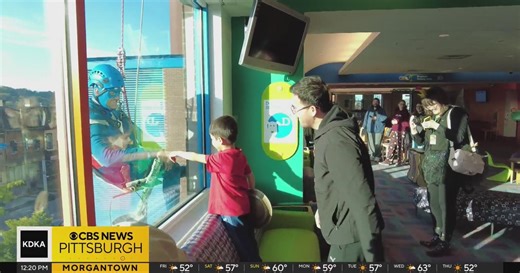 Superhero window washers return to UPMC Children's Hospital