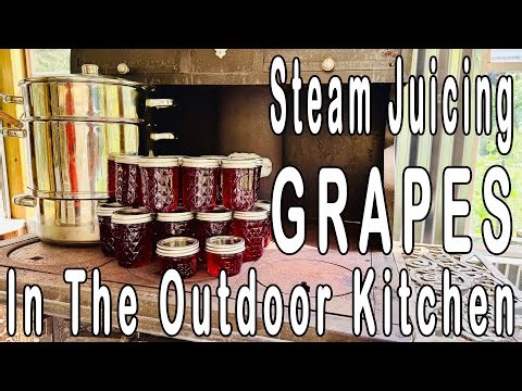 Steam Juicing Grapes In The Outdoor Kitchen