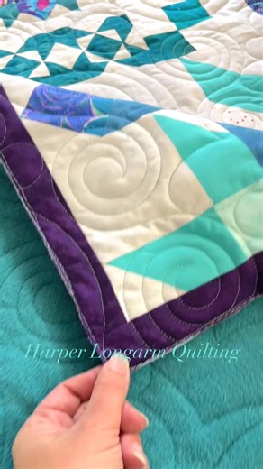 Oh, these colours! I love a good sampler quilt. I’m so happy Edith made this Barn Star Sampler in my favourite jewel toned colours… and look at those Kaffe Fassett fabrics mixed in! Love everything about this quilt including that beautiful backing. Panto is swirly hearts which just adds to the fun and joy of this quilt. Pattern: Barn Star Sampler by Shelley Cavanna @corasquilts #harperlongarmquilting #kaffeefassettfabrics #corasquilts #barnstarsampler #quilt #longarmquilting | Harper Longarm Qui