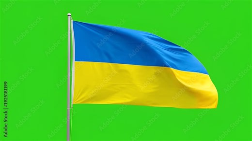 The ukrainian flag waves proudly on a flagpole against a vibrant green screen background, symbolizing national pride and resilience in a bright, clear shot.