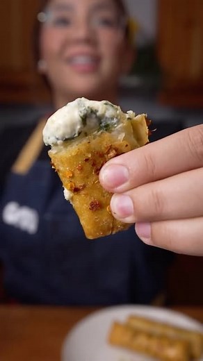 Abi Marquez | Food Content Creator on Instagram: "Creamy Spinach Lumpia? 🤔 A perfect balance of crispy and creamy in every bite Ingredients: Spinach (4 packs) 2 tbsp butter 1 medium yellow onion, whole 6 cloves of garlic Apf 1tbsp Cream cheese 1/2 bar Nestle All purpose cream 1box White Pepper Salt Hot sauce on the side, condiments Mozzarella 1 1/2 cup Lumpia Wrapper Cooking Oil for Frying Honey Chili flakes #food #foodlovers #foodlover #foodieph #foodie #filipino #cooking #delicious #yummy #in