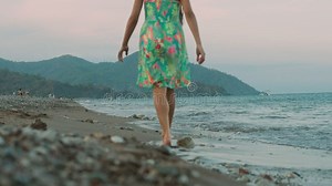 Young Girl Walking at Sea Beach at Sunset. Girl in Dress Walk on Seaside Stock Video - Video of sunset, girl: 138502253