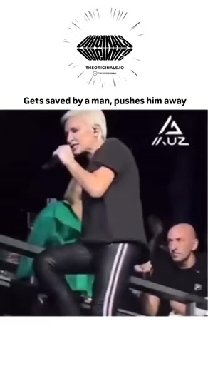 Rare Folio on Instagram: "The post features a clip from a Måneskin concert where a female fan, leaning precariously over a barrier to reach singer Damiano David, nearly falls but is pulled to safety by a man behind her, only to immediately shove his hands away in apparent dismissal. Posted by @MomsPostingLs , an account dedicated to sharing humorous or cringeworthy "L's" (losses or embarrassing moments), this video has garnered over 1.4 million views and 5,700 likes, sparking discussions on ingr