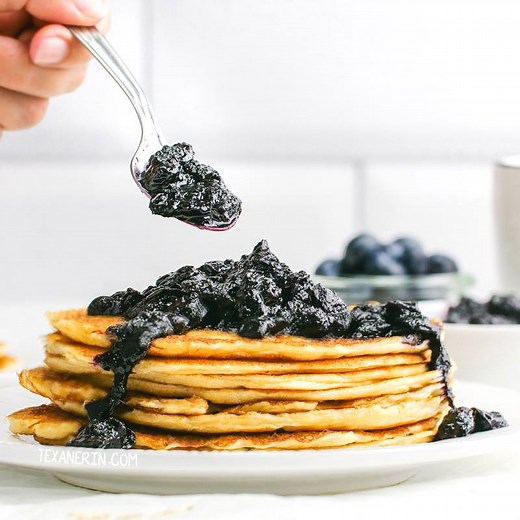 Super quick, easy and healthy blueberry sauce that’s perfect over pancakes or cheesecake! It’s only three ingredients and sweetened with maple syrup, making it naturally paleo and vegan. Click here for the printable recipe ➜ https://www.texanerin.com/blueberry-maple-syrup-sauce/ | Texanerin Baking
