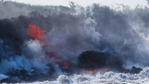 Lava from the eruption of Hawaii’s Kilauea volcano pours into the ocean.