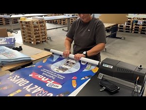 Rolling multiple posters at Distribution Plus DK - Success Story | MHP Poster Roller Machine
