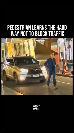 Real Men Build Society on Instagram: "Follow @societyofmales - A video circulating online shows a man walking in the middle of a busy roadway, causing traffic to slow and nearby drivers to react. The footage captures two other men approaching him, engaging in a brief verbal exchange, and then moving him out of the active traffic lane so vehicles can continue. No serious injuries are visible in the clip, and there has been no official confirmation regarding police involvement at the time of posti